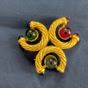 Gold Tone Brooch with Red and Green Accents
